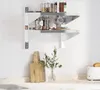 A kitchen shelf with jars, cups, and cutting boards. Anteprima dell’immagine prodotto