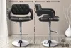 Two views of a black bar stool with dimensions indicated by measurement lines and text. Náhled obrázku produktu