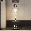 A display cabinet with various items illuminated from above. Náhled obrázku produktu