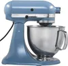 A blue KitchenAid stand mixer with a silver bowl is shown against a white background. Podgląd zdjęcia produktu