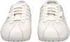 A pair of white Geox sneakers are shown from the front against a white background. Produktbild-Vorschau