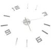 A 3D wall clock with metallic numbers and hands on a white background. Náhľad obrázku produktu