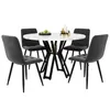A round dining table with four chairs. Produktbild-Vorschau