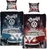 Collage of Volkswagen bus bedding and pillows with a city street background. Náhľad obrázku produktu