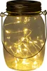 A close-up shot of a solar-powered LED lantern in a mason jar. Náhľad obrázku produktu