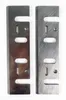 Two metal planer blades are shown against a white background. Náhľad obrázku produktu