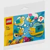A polybag containing LEGO® building toy pieces, with illustrations of assembled snail-like creatures on the front. Podgląd zdjęcia produktu