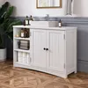 A white bathroom vanity with a sink and faucet, stocked with toiletries and towels, sits on a wooden floor. Produktbild-Vorschau