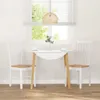A dining set with two chairs and a table in front of a window. Produktbild-Vorschau