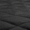 A close-up, angled view of a black quilted fabric, likely a dog car seat cover or mat. Anteprima dell’immagine prodotto