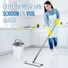 A woman is mopping a kitchen floor with a mop and bucket system. Podgląd zdjęcia produktu
