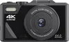 A close-up, front-facing view of a black digital camera. Produktbild-Vorschau