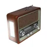 A retro-style portable radio with a wooden finish, speaker grille, display, and controls. Náhľad obrázku produktu