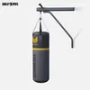 A boxing bag with a wall mount and pull-up bar, presented against a plain white background. Produktbild-Vorschau