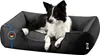 A border collie dog is lying on a black and gray dog bed. Produktbild-Vorschau