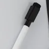 A close-up shot of the top part of a whiteboard marker with a black eraser attached to the end, resting on a white surface. Produktbild-Vorschau