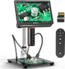A digital microscope with a screen displaying a circuit board, along with accessories like a remote control and an SD card. Náhled obrázku produktu