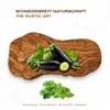 A rustic wooden cutting board with eggplants and herbs on it, with text overlay. Voir les images du produit
