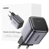 A UGREEN Nexode Mini 20W PD GaN Tech charger is shown in a studio shot, with the product packaging in the background. Voir les images du produit