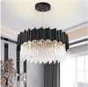A modern chandelier hanging from a white ceiling. Produktbild-Vorschau