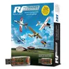 The image shows the box of a RealFlight Trainer Edition RC Flight Simulator, with various RC aircraft depicted in flight against a blue sky with clouds. Two USB dongles are also shown in the foreground. Produktbild-Vorschau