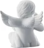 A white porcelain angel figurine shown from the back. Produktbild-Vorschau