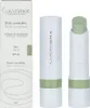 A box and two sticks of green concealer are displayed against a white background. Produktbild-Vorschau
