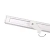 A white curtain rail with a white plastic lever mechanism attached. Produktbild-Vorschau