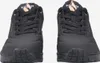 A pair of black Skechers sports shoes are shown from the front against a white background. Voir les images du produit