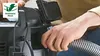 A person is attaching an antistatic hose to a vacuum cleaner. Voir les images du produit