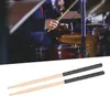 A drummer playing drums in a band. Náhľad obrázku produktu