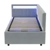 A light gray upholstered bed frame with a slatted base and LED lighting integrated into the headboard. Produktbild-Vorschau