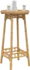 A bamboo bar table with two glasses and a pitcher of water on top. Anteprima dell’immagine prodotto