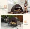 A collage showing a dog bed with a canopy indoors and outdoors, with a person reading a book and a woman sitting on a couch. Anteprima dell’immagine prodotto
