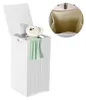 A white laundry hamper with a lid open, showing a teddy bear and a green towel inside. A close-up inset shows the interior of the hamper. Podgląd zdjęcia produktu