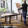A man is extending a table in a modern dining room setting. Podgląd zdjęcia produktu
