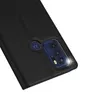 A close-up view of the back of a black smartphone case, showing the camera module and the Motorola logo. Podgląd zdjęcia produktu