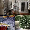 A collage of four images showing Christmas lights and decorations, including a Christmas tree, a decorated room, a street decorated with lights and people in robes, and bushes decorated with lights. Náhled obrázku produktu