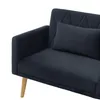 A close-up view of a dark gray sofa with a single pillow. Voir les images du produit