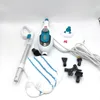 A collection of steam cleaning accessories and a steam cleaner unit are laid out on a white background. Náhled obrázku produktu