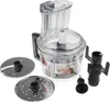 A food processor with various attachments is displayed on a white background. Voir les images du produit
