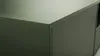 Close-up of the corner of a green cabinet. Náhled obrázku produktu