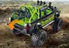 A toy off-road truck with a motorcycle in the back, on a dirt terrain. Anteprima dell’immagine prodotto