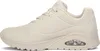 A side view of a beige SKECHERS UNO STAND ON AIR sneaker against a white background. Voir les images du produit