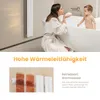 A mother and child in a bathroom, with a radiator in the background and a close-up of a radiator. Voir les images du produit
