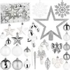 A collection of silver and white Christmas tree ornaments, including baubles, stars, snowflakes, candy canes, icicles, acorns, and pinecones, arranged on a white background. Produktbild-Vorschau