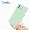 A hand holding a light green phone case against a white background. Produktbild-Vorschau