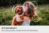 A child hugging a puppy with glowing circles highlighting parts of the image. Produktbild-Vorschau