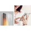 A split image showing a screen protector on the left and a person holding a phone with a clear case on the right. Náhľad obrázku produktu