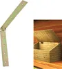 A metal hinge is shown on a white background, and a wooden chest with an open lid is shown on a wooden deck. Produktbild-Vorschau